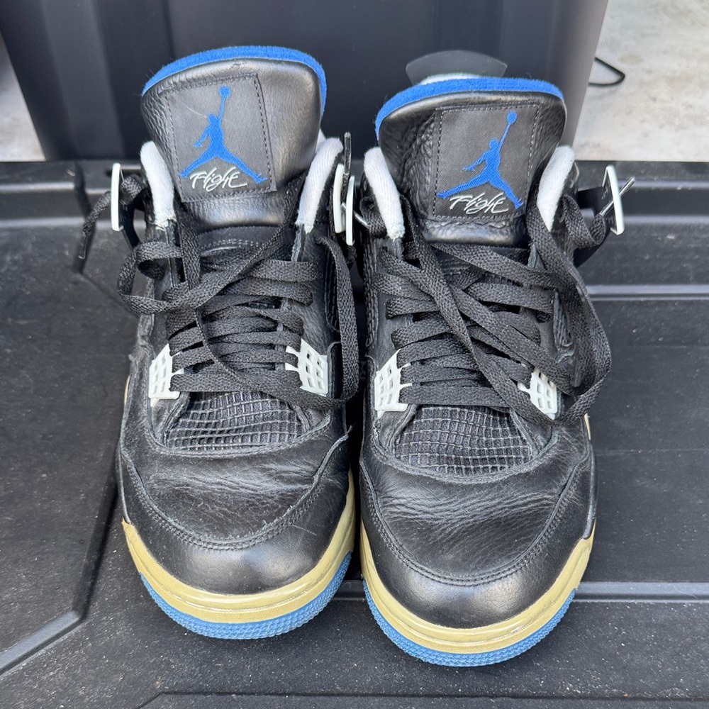 Nike Air Jordan 4 Rétro Motorsports Alternate Black and Blue Athletic Shoes